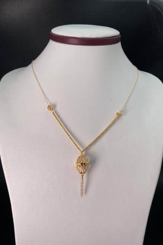 سبحة ذهبية بزخارف كروية عيار 21