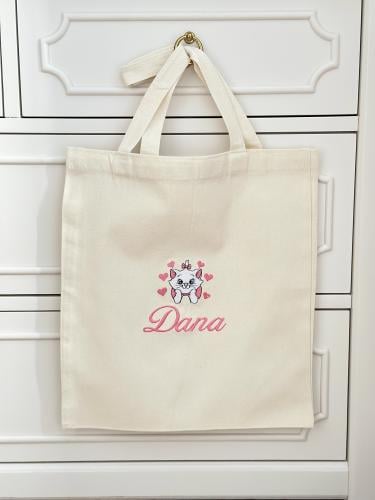 توت باق مطرز او مطبوع بالاسم والشكل