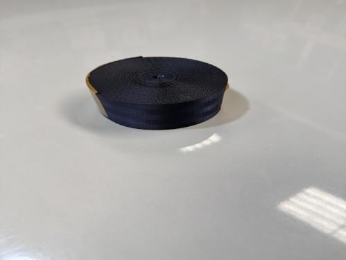 Modern manufacturing seatbelt roll, navy color, en...