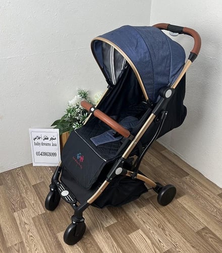 عربة أطفال خفيفة وعملية بتصميم أنيق