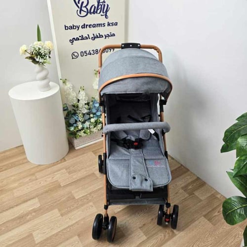 عربة أطفال أنيقة بتصميم مميز