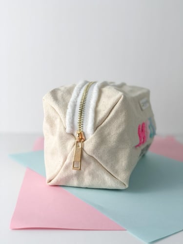 شنطة بنفت + 6قطع ميني + كيس البراند