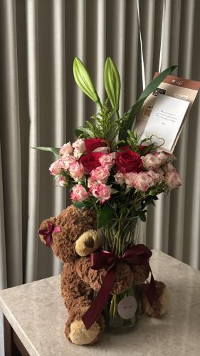 Flower vase and teddy bear (delivery inside Taif and Jeddah only)