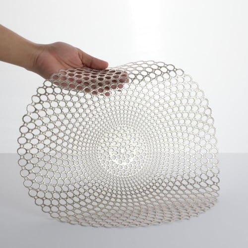 مفرش طاولة بنمط مجوف دائري الشكل لون ذهبي مقاس 37....