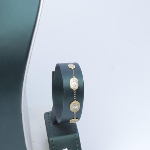 طقم ذهب عيار 18 تصميم بوشرون الماسي وزن 6.95 جرام