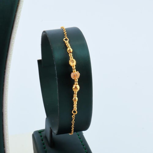 طقم ذهب تصميم كرات الدوريكاء عيار 21 وزن 7.10 جرام