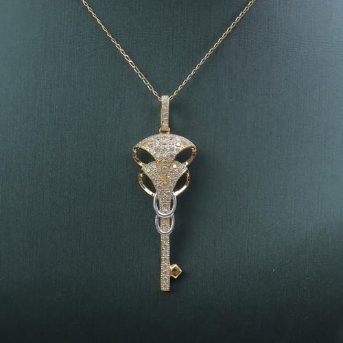 تعليقة ذهب عيار 18 مفتاح الألماس وزن 3.74 جرام