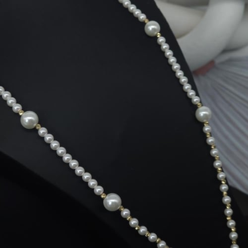 عقد مطعم بالؤلؤ الزراعي مميز بتصميم كرات الدوريكاء...