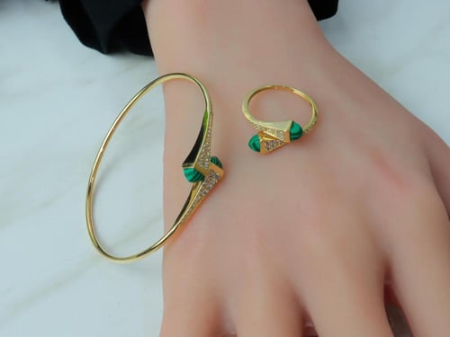 اسوارة مارلي ذهب مع خاتم بلون زيتي تصميم الماسي عي...