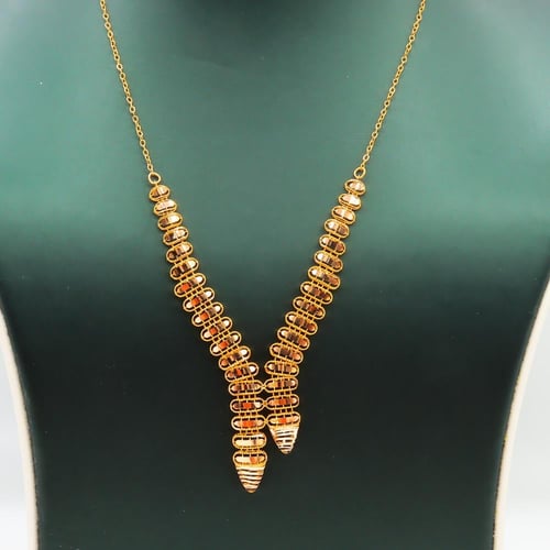 طقم ذهب عيار 21 بتصميم كرات متدرجة فاخرة وزن 9.19...