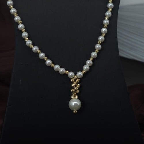 عقد مطعم بالؤلؤ الزراعي مميز بتصميم كرات الدوريكاء...