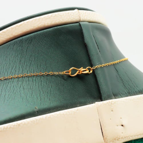 سلسال ذهب عيار ٢١ بتصميم الكوين وزن 0.99 جرام