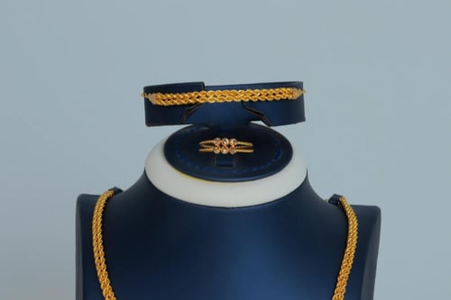 طقم ذهب المبروم عيار 21 وزن 14 جرام