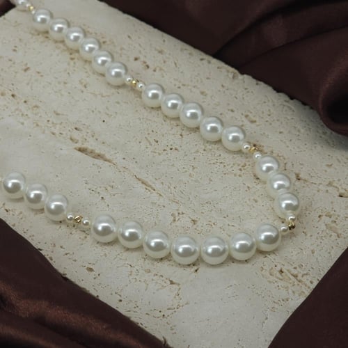 عقد مطعم بالؤلؤ الزراعي بتصميم الكرات الذهبية لأطل...