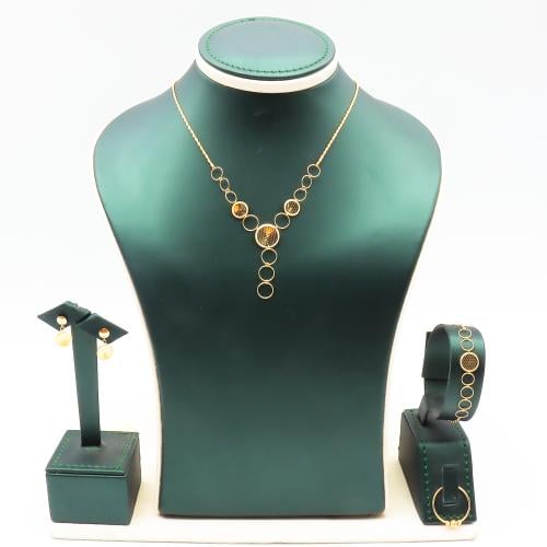 طقم ذهب صافي عيار 18 – تصميم دوائري ناعم بوزن 6.56...