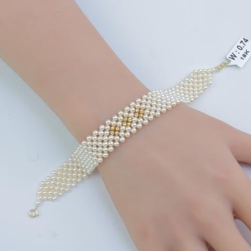 سوارة ذهب مطعم بالؤلؤ الصناعي عيار 18 وزن 0.7 جرام