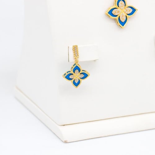 طقم روبيرتو كوين عيار 18 وزن 14.4 جرام