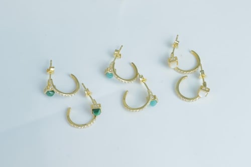 حلق ذهب عيار 18 تصميم مارلي الماسي وزن 2.1 جرام