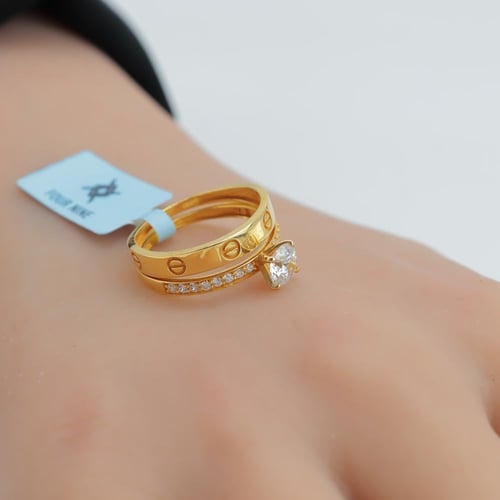 خاتم توينز ذهب عيار 21 بتصميم اللوف الالماسى وزن 3...