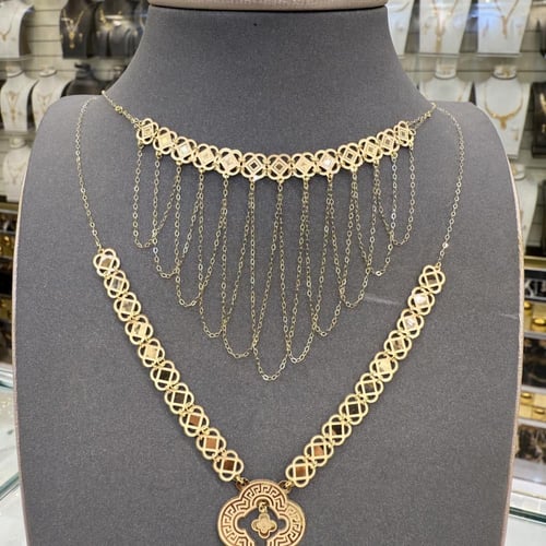 طقم ذه مع المخنق ناعم عيار 18 وزن 5.36 جرام