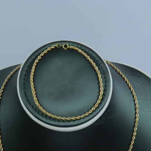 كلكشن عقد واسوارة المبروم ذهب عيار 18 وزن 2.47 جرا...