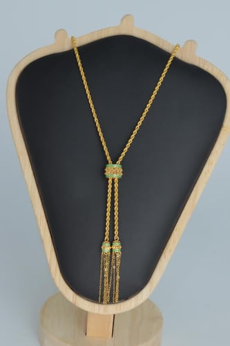 سبحة ذهب عيار 21 مطعمة بالميناء الاخضر الفاتح وزن...