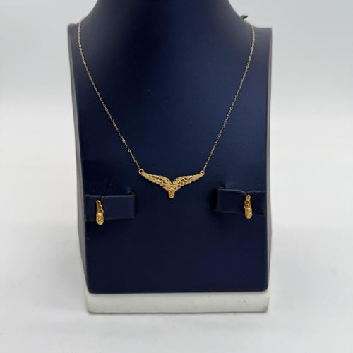 طقم ذهب جناح الصقر ذهب صافي عيار 21 وزن 3.7 جرام