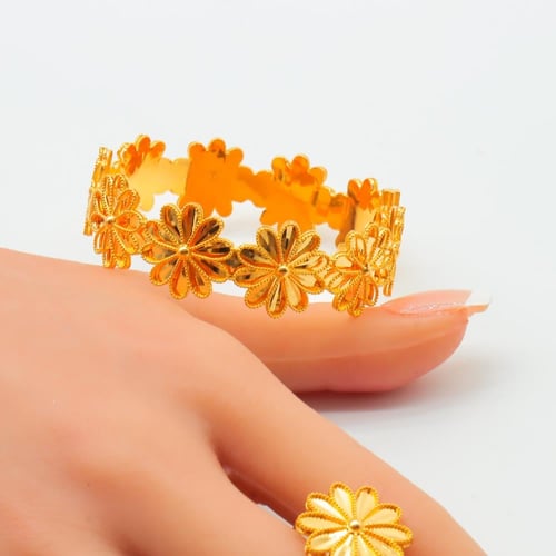 اسوارة مع خاتم ذهب عيار 21 وزن 19.3 جرام بتصميم ال...