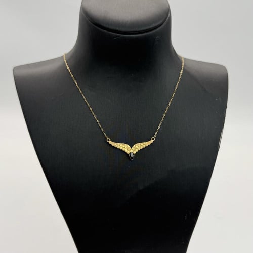 عقد ذهب جناح الصقر عيار 21 باللون الاسود وزن 1.2 ج...