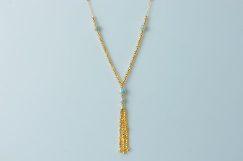 سبحة طويلة ذهب عيار 21 مطعمة بالميناء وزن 15.89 جر...