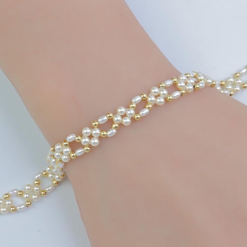 سوارة ذهب مطعم بالؤلؤ الصناعي عيار 18 وزن 1.59 جرا...