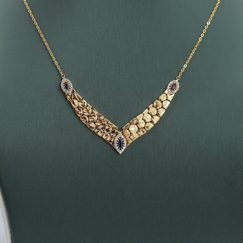 طقم ذهب عيار 21 تصميم جناح صقر الماسي وزن 13.03 جر...