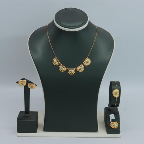 طقم ذهب الرمش عيار 21 مطعم بحبة لولو فيروزي وزن 10...