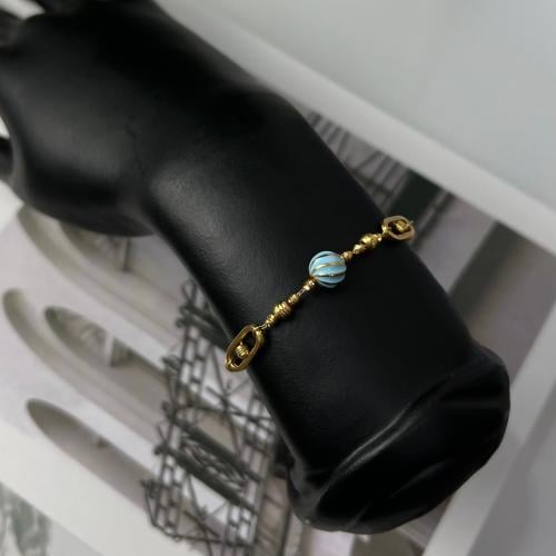 سوارة ذهب عيار 21 مطعمة بالمينا التيفاني وزن 3,6 ج...