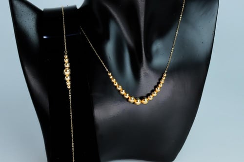 كلكشن ذهب الببلز سلسال واسوارة عيار 18 وزن 3.1 جرا...