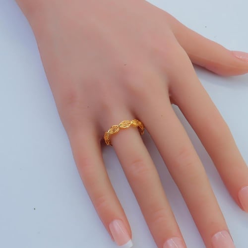 دبلة ذهب عيار 21 تصميم متشابك وزن 1.48 جرام – نعوم...