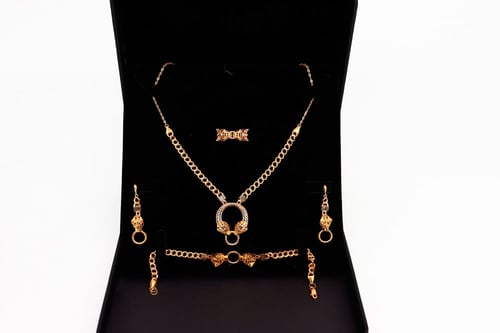 طقم ذهب TIGER فخم عيار 21 | متجر الكنوز الذهبية