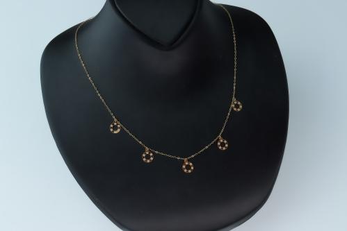 شوكر ذهب نواعم عيار 18 مزين بدوائر انيقة بوزن 0.7...