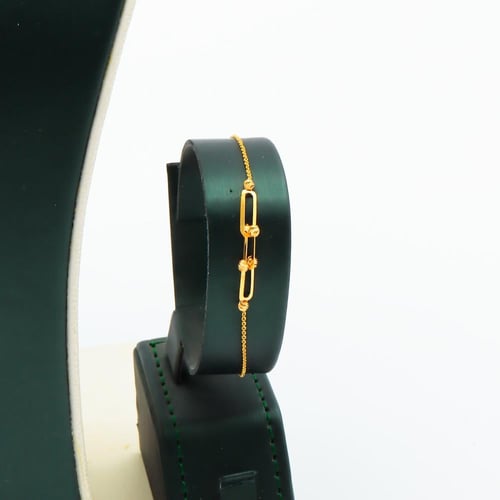 طقم ذهب عيار 21 وزن 6.59 جرام بتصميم تعليقة طولية...