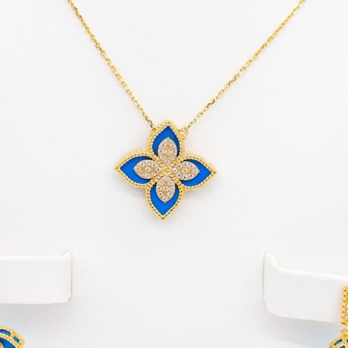 طقم روبيرتو كوين عيار 18 وزن 14.4 جرام