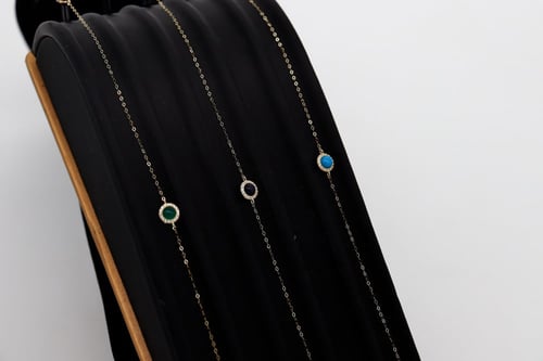 سوارة ذهب تصميم الماسي متوفرة بعده الوان عيار 18