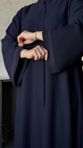 عبايه كحلي مقفله كامل بالطقطق