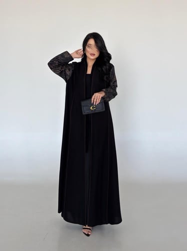 كريب لمار اسود مع تداخلات جاكار بني في الاكمام نص...