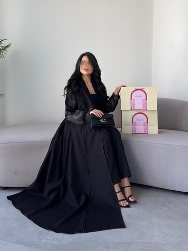 كريب لمار اسود مع تداخلات جاكار بني في الاكمام نص...