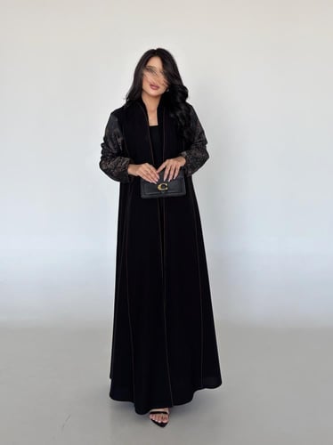 كريب لمار اسود مع تداخلات جاكار بني في الاكمام نص...