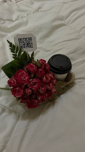 Flower arrangement with coffee
