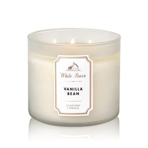 Vanilla scented candle between Bath & Body Works 4...