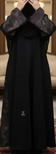 Black abaya, fabric of elegance, standing, tapped