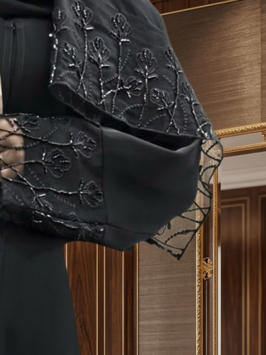 Black abaya, crepe royal fabric, with a snap, and a plain trim