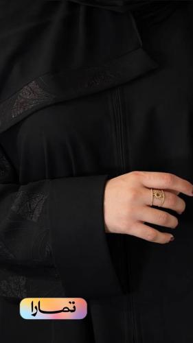 Luxurious black abaya with jacquard sleeves in an elegant design